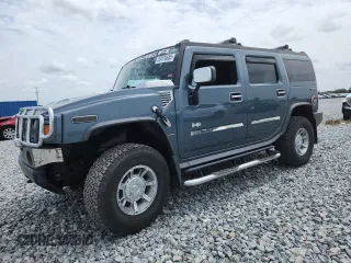 2005 Hummer H2 SUV z VIN 5GRGN23U15H127843, wystawiony jako Copart lot #59170655 z przebiegiem 154 576 mil mil oraz Szkoda całkowita • Salvage title. Historia ofert i sprzedaży dostępna na DreamBid. Obrazek 1.
