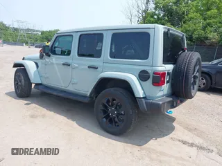 2023 Jeep Wrangler Sahara with VIN 1C4JJXP6XPW554741, listed as a IAAI auction lot 42380681 with 15,148 mi miles and . Bid and sale history available at DreamBid. Image 3.
