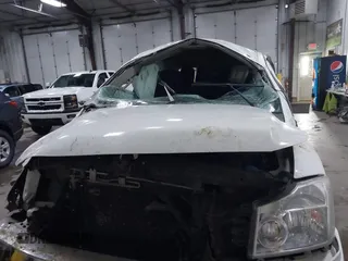2013 Nissan Titan Pro-4X with VIN 1N6BA0EC7DN311469, listed as a IAAI auction lot 41945284 with 88,225 mi miles and . Bid and sale history available at DreamBid. Image 6.