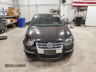 2006 Volkswagen Jetta 1.9L TDI z VIN 3VWST71KX6M711152, wystawiony jako Copart lot #57435505 z przebiegiem 209 511 mil mil oraz Nie do naprawy • Non repairable. Historia ofert i sprzedaży dostępna na DreamBid. Obrazek 5.