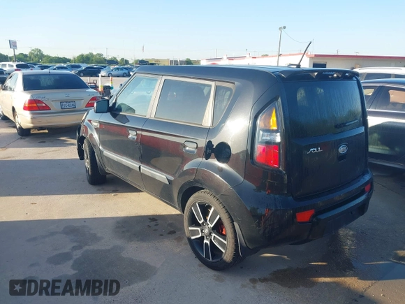 2010 Kia Soul + with VIN KNDJT2A25A7127326, listed as a IAAI auction lot 41966153 with 216,660 mi miles. Bid and sale history available at carsss.com. Image 3.