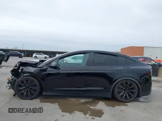 2023 Tesla Model X Plaid with VIN 7SAXCBE63PF376320, listed as a IAAI auction lot 40954738 with Not Provided miles and . Bid and sale history available at DreamBid. Image 15.