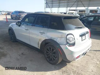 2015 MINI Hardtop 4 Door S z VIN WMWXU3C55F2B66314, wystawiony jako IAAI lot #42211312 z przebiegiem 101 395 mil mil oraz . Historia ofert i sprzedaży dostępna na DreamBid. Obrazek 3.