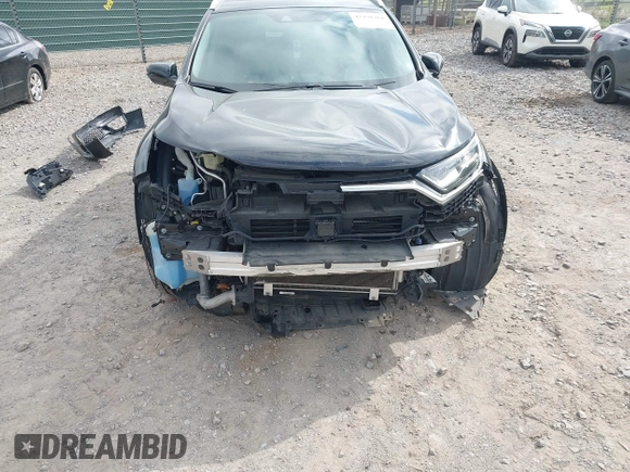 2021 Honda CR-V Touring with VIN 5J6RW2H92ML003064, listed as a IAAI auction lot 42298361 with 70,988 mi miles and . Bid and sale history available at DreamBid. Image 6.