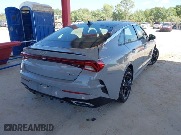 2023 Kia K5 GT-Line z VIN 5XXG64J24PG183772, wystawiony jako IAAI lot #42155447 z przebiegiem 25 313 mil mil oraz . Historia ofert i sprzedaży dostępna na DreamBid. Obrazek 4.