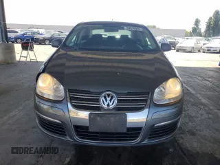 2010 Volkswagen Jetta S with VIN 3VWJZ7AJ9AM052569, listed as a Copart auction lot 59016965 with 166,950 mi miles and Salvage title. Bid and sale history available at DreamBid. Image 5.