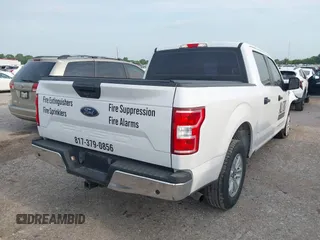 2020 Ford F-150 XL with VIN 1FTEW1CB7LKF25864, listed as a IAAI auction lot 42145041 with 116,651 mi miles and . Bid and sale history available at DreamBid. Image 4.