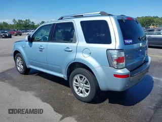 2008 Mercury Mariner Premier z VIN 4M2CU87188KJ39169, wystawiony jako IAAI lot #42299329 z przebiegiem 146 104 mil mil oraz . Historia ofert i sprzedaży dostępna na DreamBid. Obrazek 3.