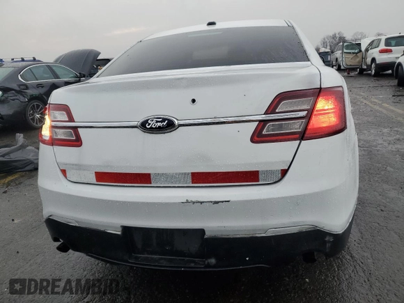 2014 Ford Police Interceptor with VIN 1FAHP2L83EG138213, listed as a Copart auction lot 83946044 with 130,742 mi miles and Salvage title. Bid and sale history available at DreamBid. Image 6.