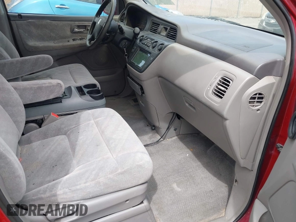 2003 Honda Odyssey EX with VIN 5FNRL18643B086576, listed as a IAAI auction lot 41991328 with 130,025 mi miles and . Bid and sale history available at carsss.com. Image 5.