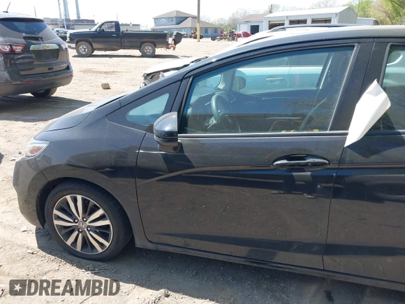 2015 Honda Fit EX-L with VIN 3HGGK5H88FM757753, listed as a IAAI auction lot 42096497 with 121,863 mi miles and . Bid and sale history available at DreamBid. Image 14.