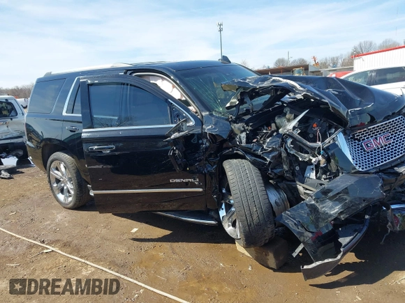 2017 GMC Yukon Denali with VIN 1GKS2CKJ0HR185365, listed as a IAAI auction lot 41856187 with 107,641 mi miles. Bid and sale history available at carsss.com. Image 12.