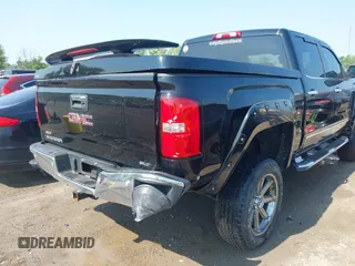 2014 GMC Sierra 1500 SLT with VIN 3GTU2VEC1EG363079, listed as a IAAI auction lot 42419679 with 128,055 mi miles and . Bid and sale history available at DreamBid. Image 6.