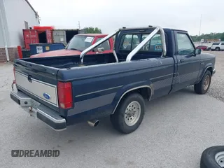 1990 Ford Ranger XLT z VIN 1FTCR10X1LPB26207, wystawiony jako IAAI lot #42306083 z przebiegiem 39 173 mil mil oraz . Historia ofert i sprzedaży dostępna na DreamBid. Obrazek 4.