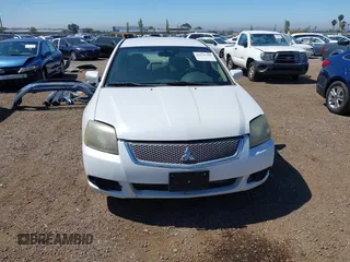 2010 Mitsubishi Galant ES z VIN 4A32B3FF7AE004192, wystawiony jako IAAI lot #42235309 z przebiegiem 101 188 mil mil oraz . Historia ofert i sprzedaży dostępna na DreamBid. Obrazek 12.