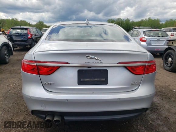 2017 Jaguar XF with VIN SAJBL4BN6HCY44054, listed as a Copart auction lot 55842675 with 124,273 mi miles and Salvage Title. Bid and sale history available at DreamBid. Image 6.