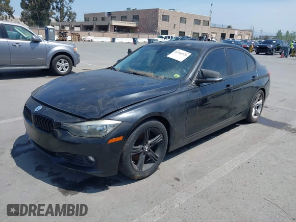 2013 BMW 3 Series 328i with VIN WBA3A5C52DF352107, listed as a IAAI auction lot 42169521 with 125,141 mi miles. Bid and sale history available at carsss.com. Image 2.