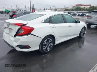 2016 Honda Civic Sedan EX-L with VIN 2HGFC1F78GH648639, listed as a IAAI auction lot 41895039 with 121,072 mi miles. Bid and sale history available at carsss.com. Image 4.