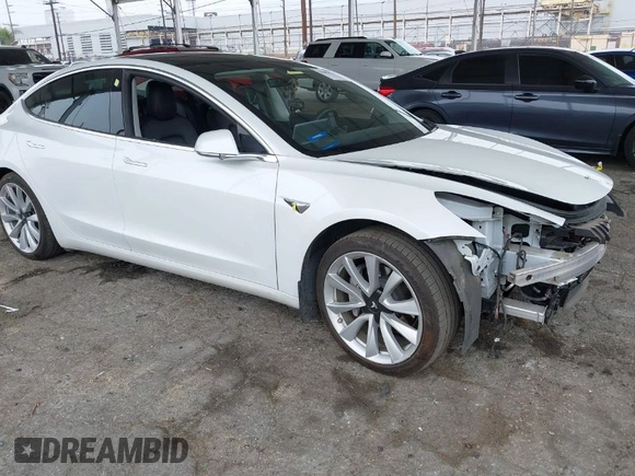 2020 Tesla Model 3 Long Range with VIN 5YJ3E1EB5LF801530, listed as a IAAI auction lot 41682050 with 65,743 mi miles. Bid and sale history available at carsss.com. Image 1.