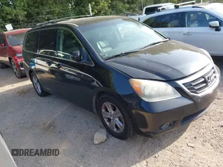 2010 Honda Odyssey Touring with VIN 5FNRL3H96AB031016, listed as a IAAI auction lot 42828397 with 261,881 mi miles and . Bid and sale history available at DreamBid. Image 1.
