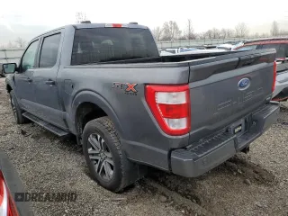 2021 Ford F-150 XL with VIN 1FTEW1EP7MFD02131, listed as a Copart auction lot 48948365 with 94,109 mi miles and Salvage Title. Bid and sale history available at carsss.com. Image 2.