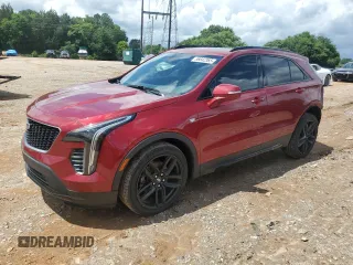 2019 Cadillac XT4 FWD Sport with VIN 1GYFZER47KF123100, listed as a Copart auction lot 56642365 with 85,599 mi miles and Salvage title. Bid and sale history available at DreamBid. Image 1.