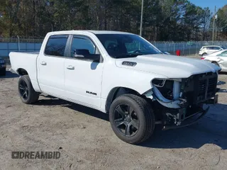 2022 Ram 1500 Big Horn z VIN 1C6RREFT8NN230768, wystawiony jako IAAI lot #40994441 z przebiegiem 40 072 mil mil oraz . Historia ofert i sprzedaży dostępna na DreamBid. Obrazek 1.