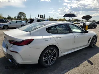 2023 BMW 8 Series 840i with VIN WBAGV4C01PCL65666, listed as a Copart auction lot 47543754 with 31,703 mi miles. Bid and sale history available at carsss.com. Image 3.