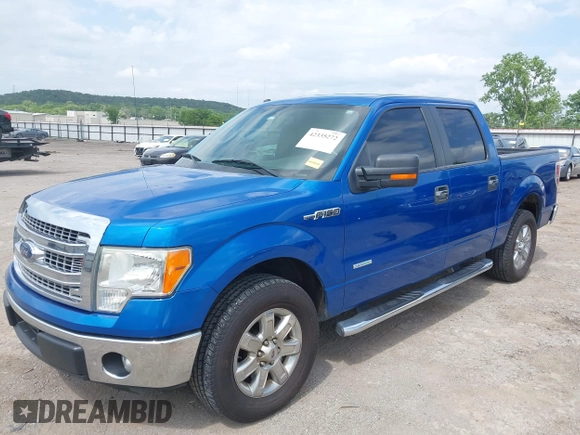 2014 Ford F-150 XL with VIN 1FTFW1CT6EKF05542, listed as a IAAI auction lot 42335272 with 169,985 mi miles and . Bid and sale history available at DreamBid. Image 2.