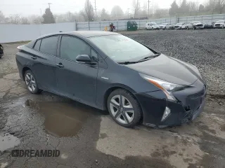 2017 Toyota Prius Two z VIN JTDKARFU3H3041401, wystawiony jako Copart lot #88738245 z przebiegiem 79 152 mil mil oraz Szkody całkowita. Historia ofert i sprzedaży dostępna na DreamBid. Obrazek 4.