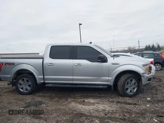 2019 Ford F-150 XL with VIN 1FTEW1E45KFB55357, listed as a IAAI auction lot 41708291 with 114,099 mi miles. Bid and sale history available at carsss.com. Image 13.