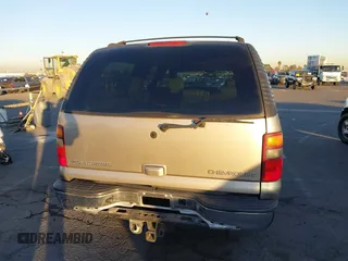 2003 Chevrolet Suburban LS with VIN 1GNEC16T43J269726, listed as a IAAI auction lot 41109855 with 122,820 mi miles. Bid and sale history available at carsss.com. Image 16.