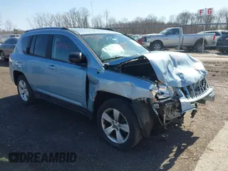 2013 Jeep Compass Latitude with VIN 1C4NJDEB2DD263920, listed as a IAAI auction lot 41832542 with 128,018 mi miles. Bid and sale history available at carsss.com. Image 1.