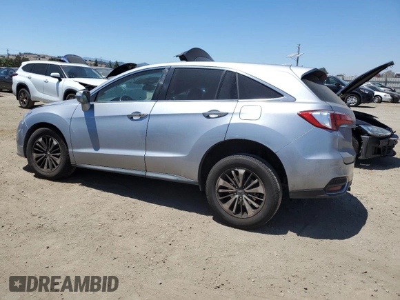 2018 Acura RDX Advance with VIN 5J8TB4H74JL001735, listed as a Copart auction lot 64629135 with 87,235 mi miles and Salvage title. Bid and sale history available at DreamBid. Image 2.
