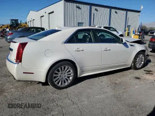 2012 Cadillac CTS Premium z VIN 1G6DP5E3XC0151349, wystawiony jako Copart lot #87004164 z przebiegiem 72 433 mil mil oraz Szkoda całkowita • Salvage title. Historia ofert i sprzedaży dostępna na DreamBid. Obrazek 3.