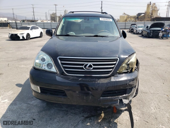 2004 Lexus GX 470 with VIN JTJBT20XX40068513, listed as a Copart auction lot 71554824 with 208,790 mi miles and Salvage Title. Bid and sale history available at carsss.com. Image 5.