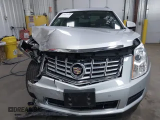 2014 Cadillac SRX Luxury Collection z VIN 3GYFNEE36ES679505, wystawiony jako IAAI lot #41817608 z przebiegiem 62 351 mil mil oraz . Historia ofert i sprzedaży dostępna na DreamBid. Obrazek 17.