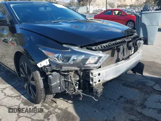 2018 Nissan Maxima S with VIN 1N4AA6AP9JC388366, listed as a IAAI auction lot 41842042 with 103,597 mi miles and . Bid and sale history available at DreamBid. Image 6.