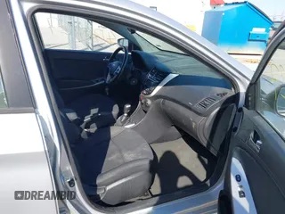 2012 Hyundai Accent SE with VIN KMHCU5AE0CU021092, listed as a IAAI auction lot 41789027 with 137,557 mi miles. Bid and sale history available at carsss.com. Image 5.
