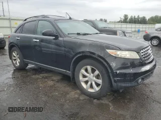 2005 Infiniti FX z VIN JNRAS08W05X217666, wystawiony jako Copart lot #37808544 z przebiegiem 172 472 mil mil oraz Szkoda całkowita • Salvage title. Historia ofert i sprzedaży dostępna na DreamBid. Obrazek 4.