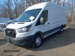 2023 Ford Transit Cargo with VIN 1FTBR3U88PKB01785, listed as a IAAI auction lot 41681093 with 47,672 mi miles and . Bid and sale history available at DreamBid. Image 17.