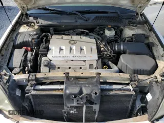 2003 Cadillac DeVille DTS z VIN 1G6KF57933U147843, wystawiony jako Copart lot #55875195 z przebiegiem 160 814 mil mil oraz Szkody całkowita. Historia ofert i sprzedaży dostępna na DreamBid. Obrazek 11.