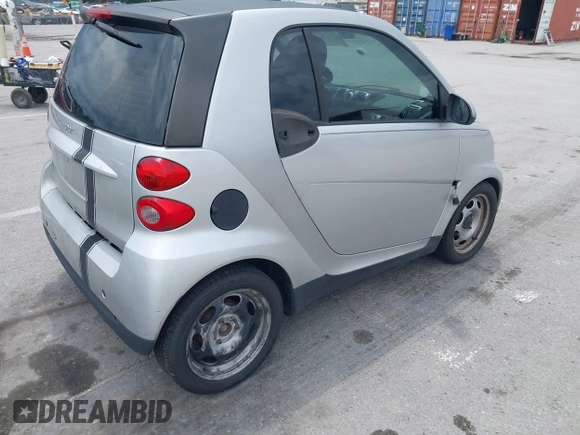2009 Smart fortwo Pure with VIN WMEEJ31X69K317204, listed as a IAAI auction lot 42779603 with 159,179 mi miles and . Bid and sale history available at DreamBid. Image 4.