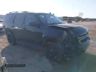 2007 Chevrolet Tahoe LS z VIN 1GNFC13CX7R406202, wystawiony jako IAAI lot #41951878 z przebiegiem 181 571 mil mil oraz . Historia ofert i sprzedaży dostępna na DreamBid. Obrazek 1.