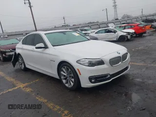 2014 BMW 5 Series 528i with VIN WBA5A5C51ED509079, listed as a IAAI auction lot 41561930 with 65,987 mi miles. Bid and sale history available at carsss.com. Image 1.