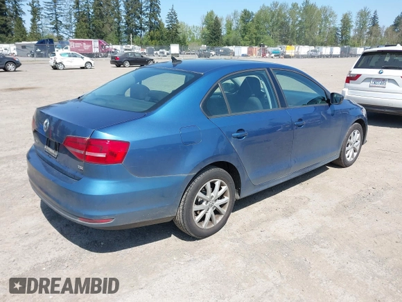 2015 Volkswagen Jetta Sedan 1.8T SE with VIN 3VWD17AJ1FM270114, listed as a IAAI auction lot 42128816 with 111,701 mi miles. Bid and sale history available at carsss.com. Image 4.