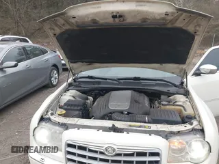 2006 Chrysler 300 C with VIN 2C3LA63H06H189644, listed as a IAAI auction lot 41718103 with 290,418 mi miles. Bid and sale history available at carsss.com. Image 10.