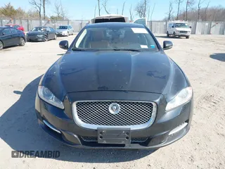 2013 Jaguar XJ Portfolio with VIN SAJWJ2GDXD8V55879, listed as a IAAI auction lot 41568366 with 121,119 mi miles and . Bid and sale history available at DreamBid. Image 12.