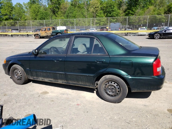 1999 Mazda Protege DX with VIN JM1BJ2223X0139775, listed as a Copart auction lot 54338455 with 63,198 mi miles and Salvage Title. Bid and sale history available at DreamBid. Image 2.