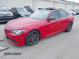 2019 Alfa Romeo Giulia Ti Sport with VIN ZARFAMBN0K7606969, listed as a IAAI auction lot 41962828 with 46,544 mi miles and . Bid and sale history available at DreamBid. Image 2.